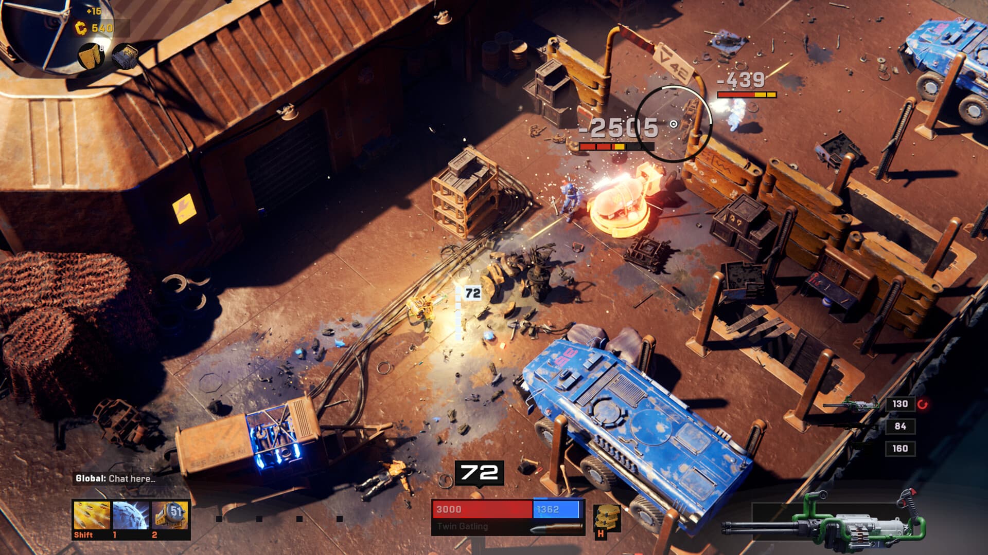 A SYNTHETIK 2 soldier fighting robots in an industrial yard beside a blue armored vehicle.