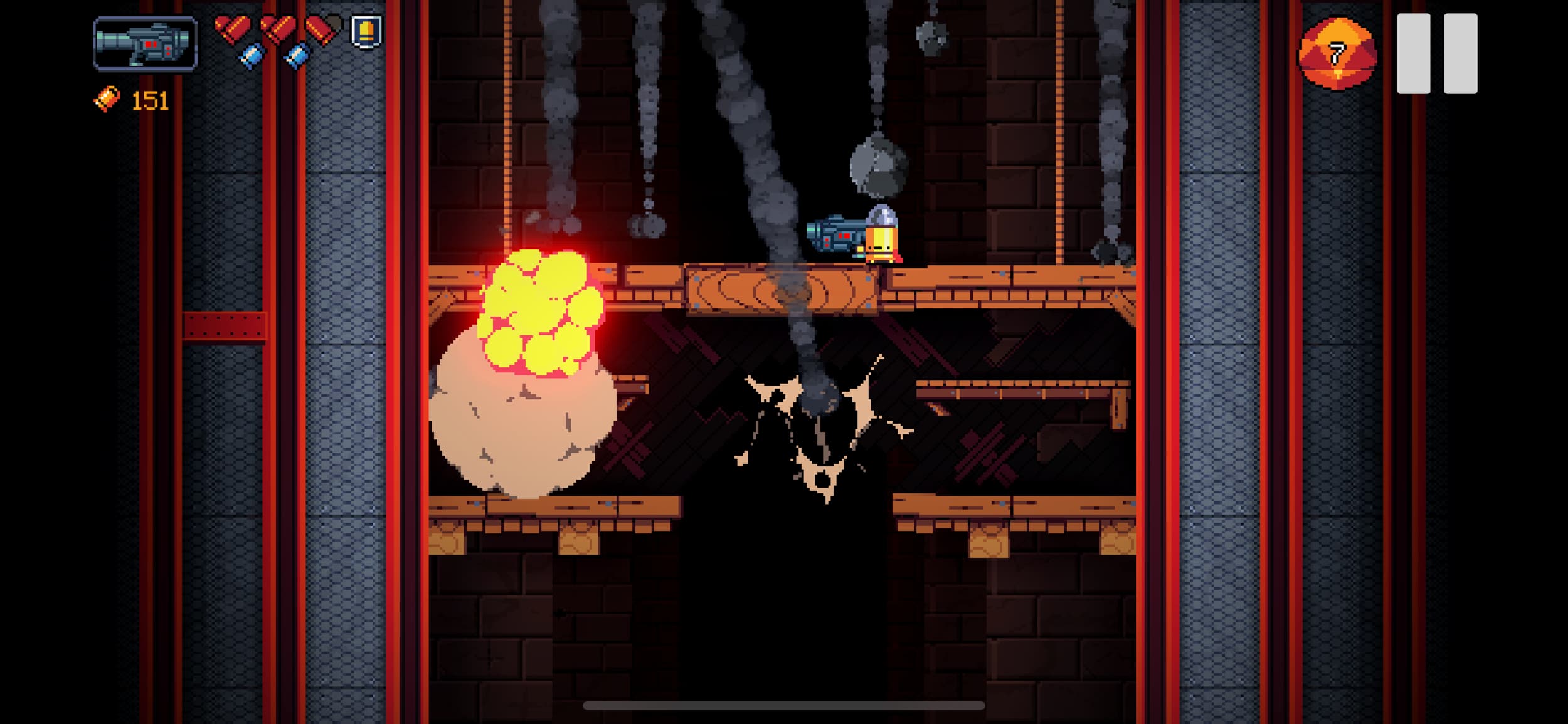Das seitliche Gameplay von Exit the Gungeon zeigt eine Figur auf einer einstürzenden Plattform, während eine Explosion die Kammer erhellt.