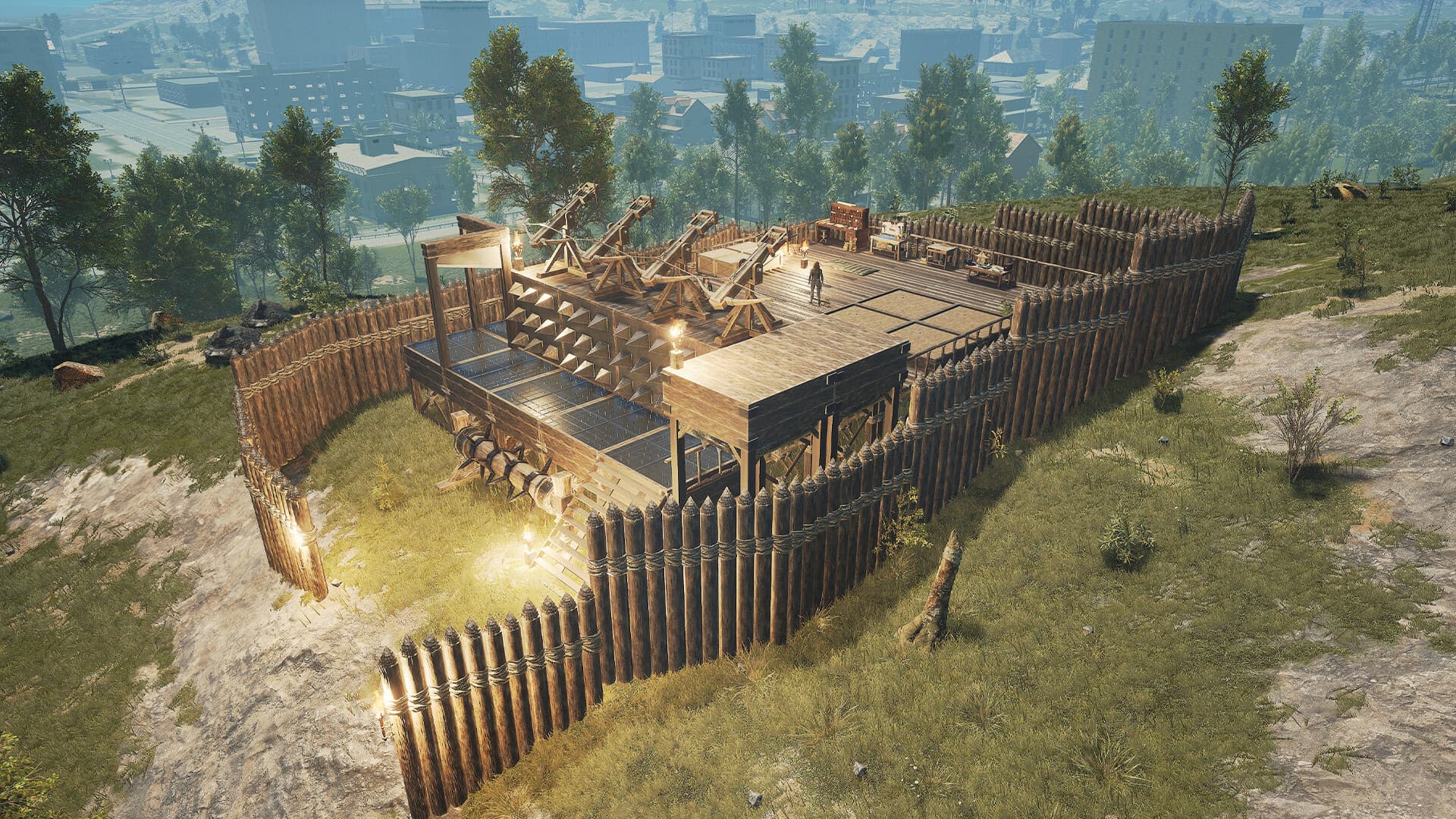 Elevated wooden fort with palisades and ballistae