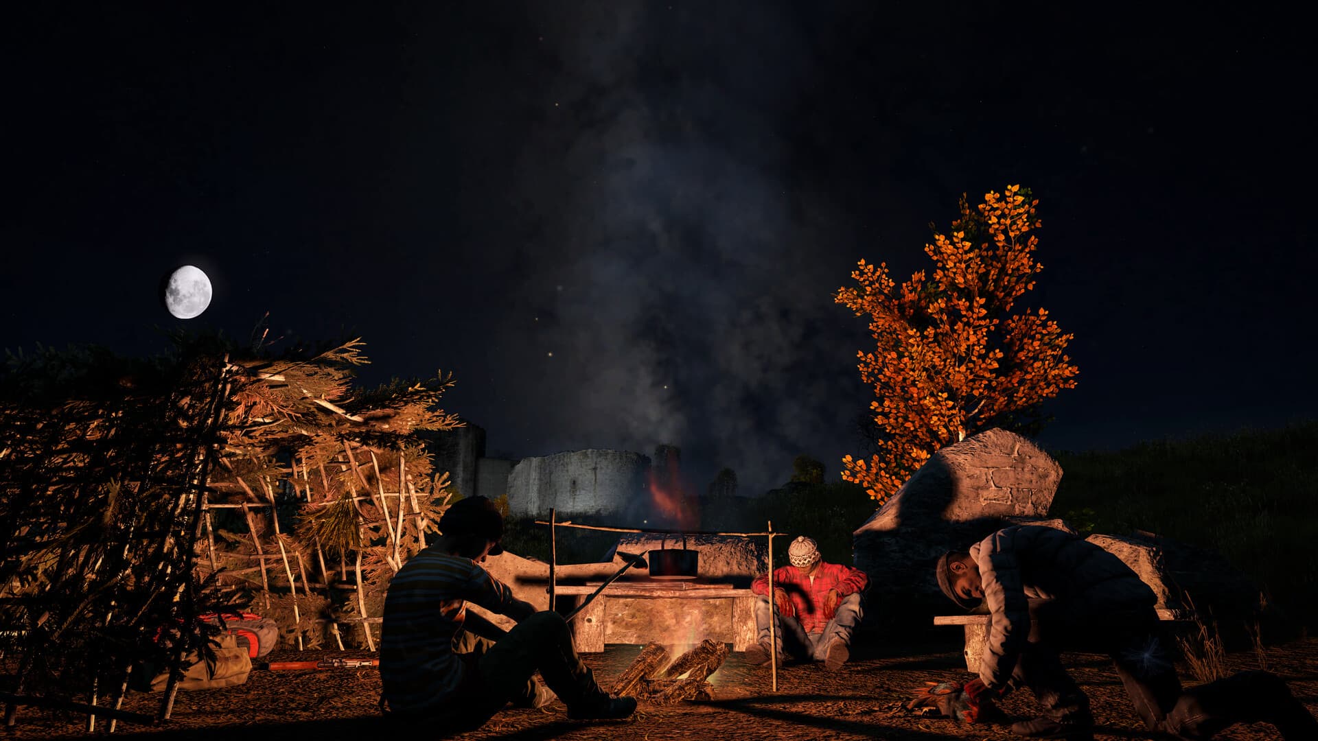 Three DayZ survivors sit around a nighttime fire beside a suspended cooking pot and a stick holding food.